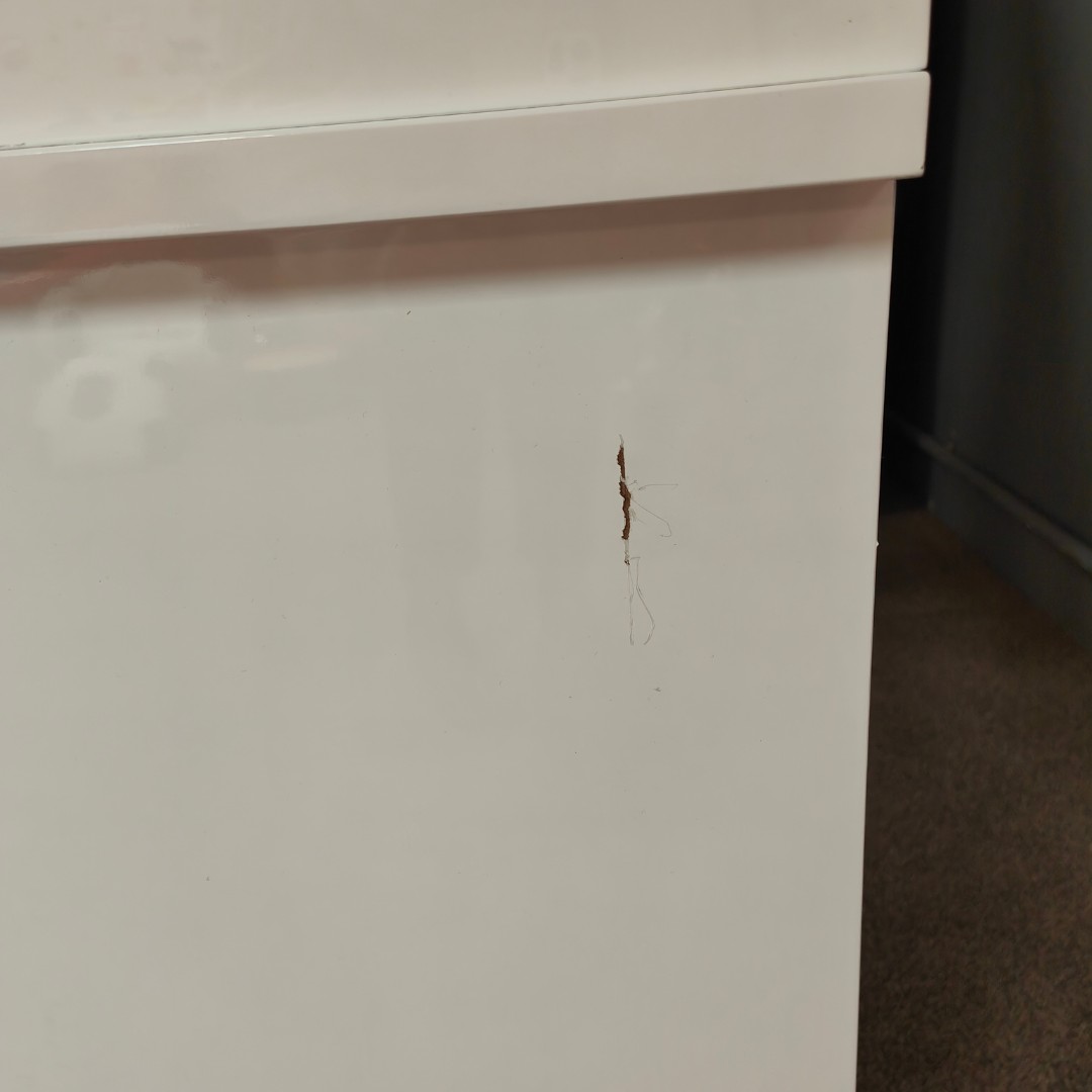 Adela desk damage